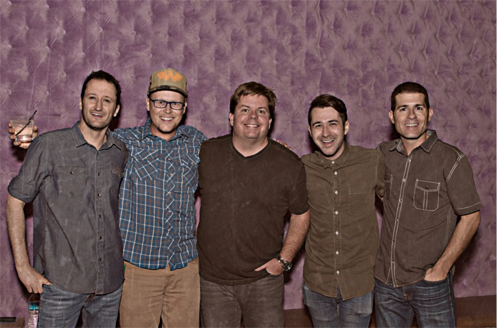 Dan Mengini with comedy crew group photo