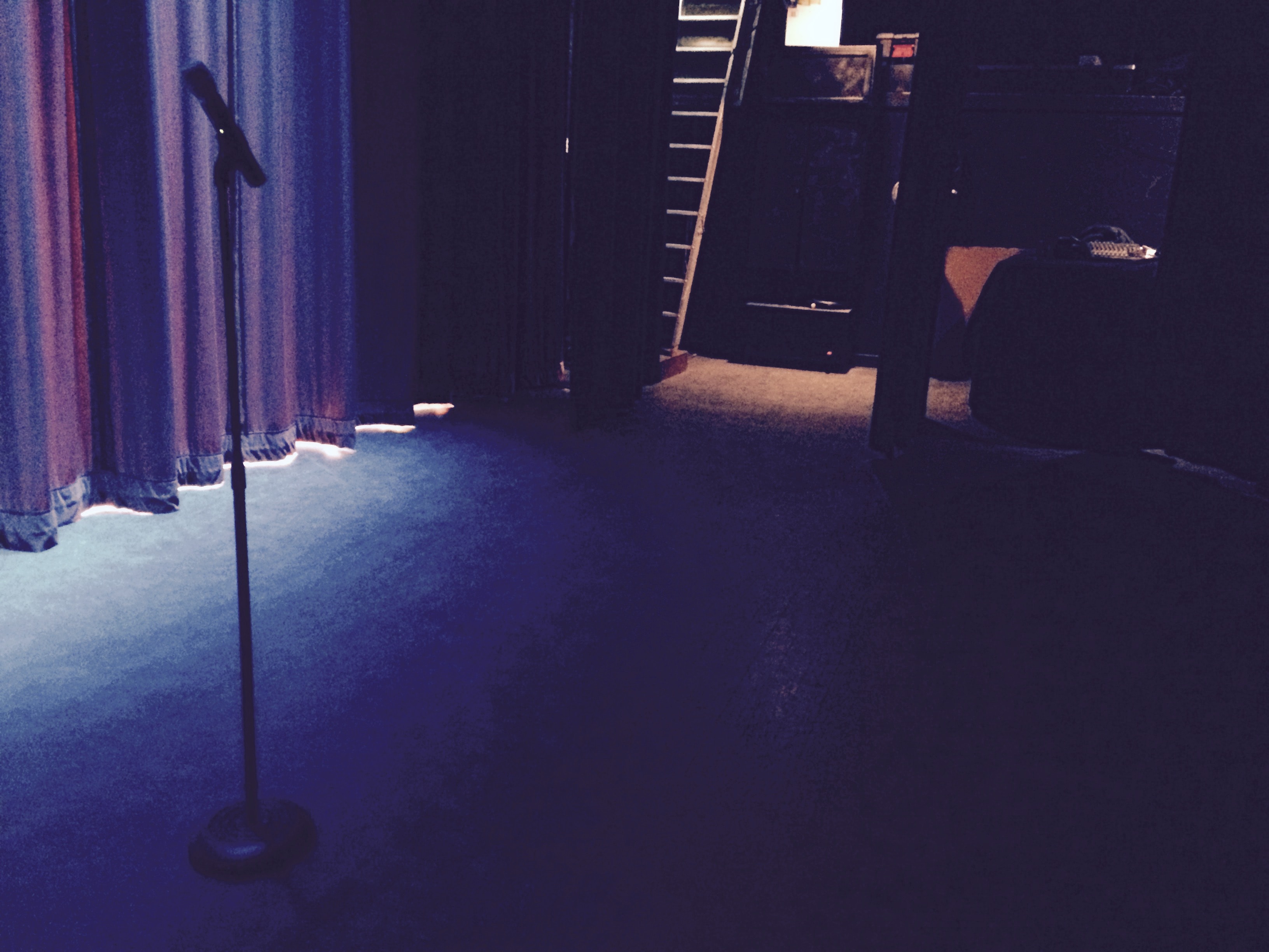 Microphone stand on empty stage before a show