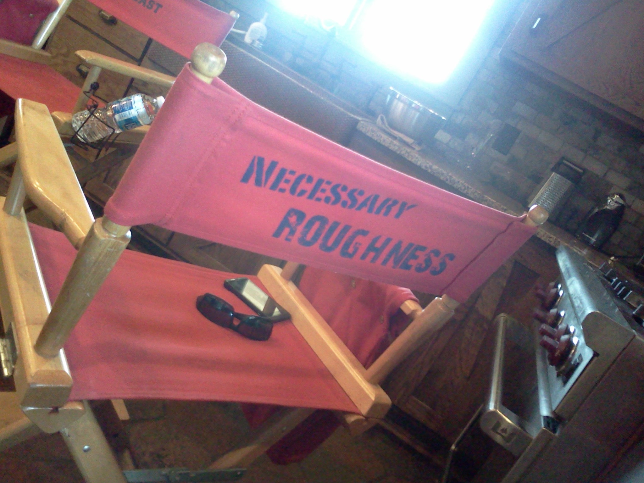 Necessary Roughness director's chair on set