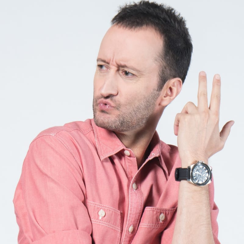 Dan Mengini at a comedy venue